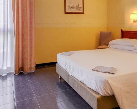 Check out the classic rooms of the 4 star Hotel San Donato Bologna