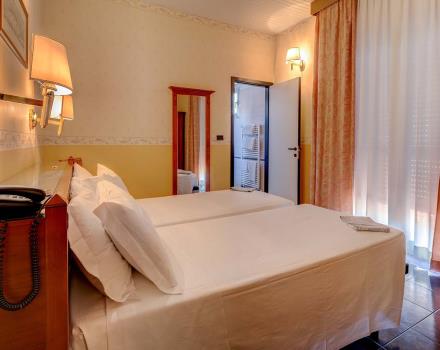 Comfort in the classic room of the Hotel San Donato in Bologna