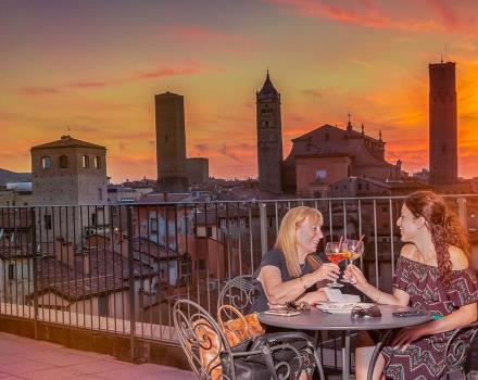 The aperitif on the terrace of the Hotel San Donato admiring Bologna