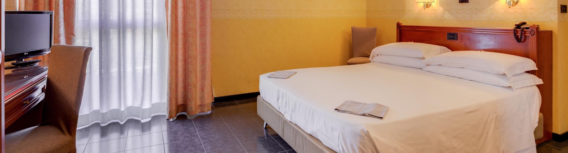 Check out the classic rooms of the 4 star Hotel San Donato Bologna
