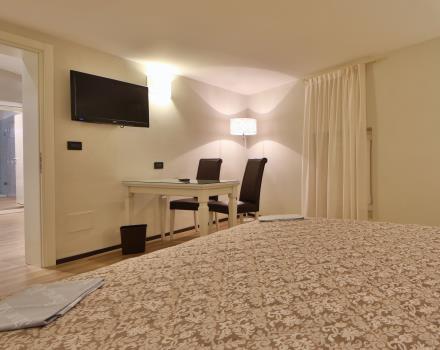 Modern and spacious Family rooms for 4 people at the Hotel San Donato